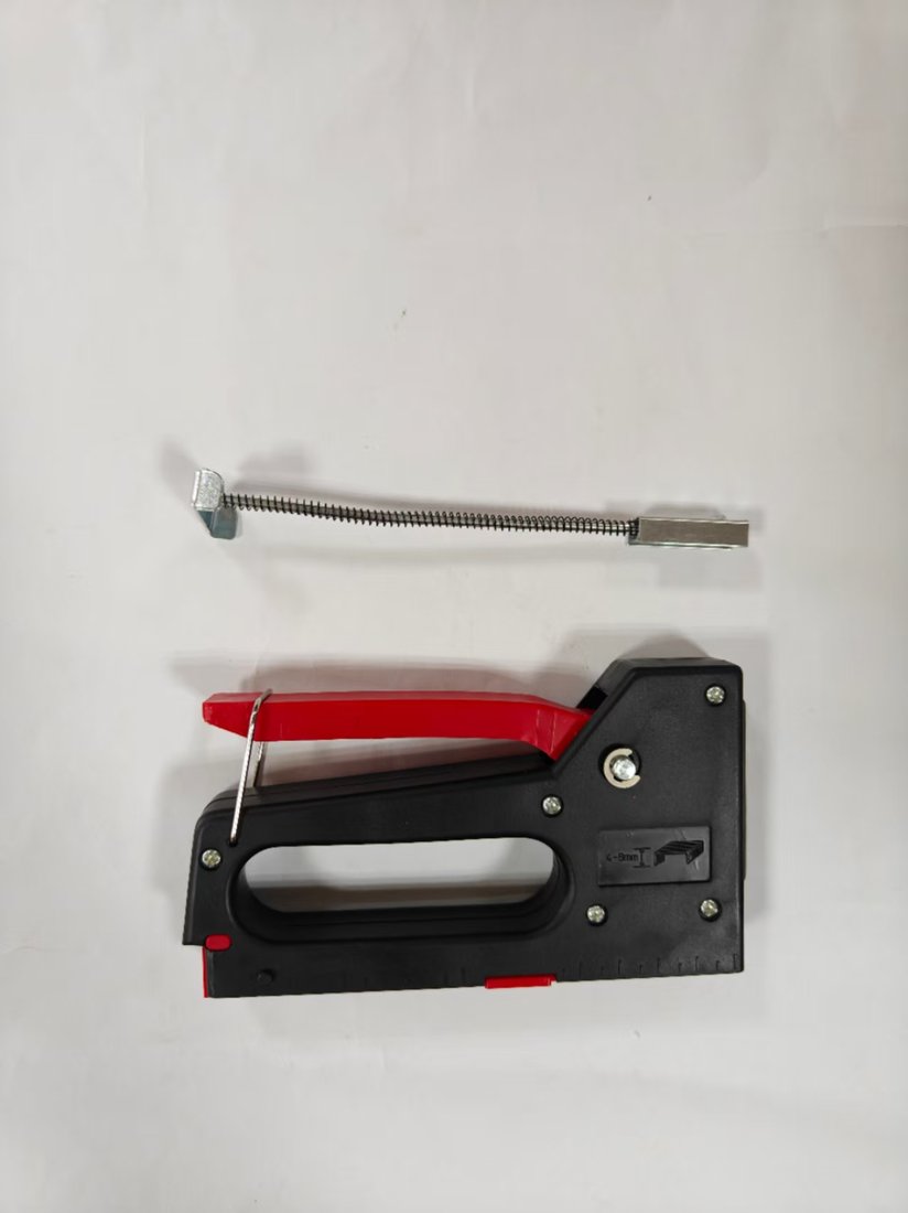 Staple gun with staple-viewing window